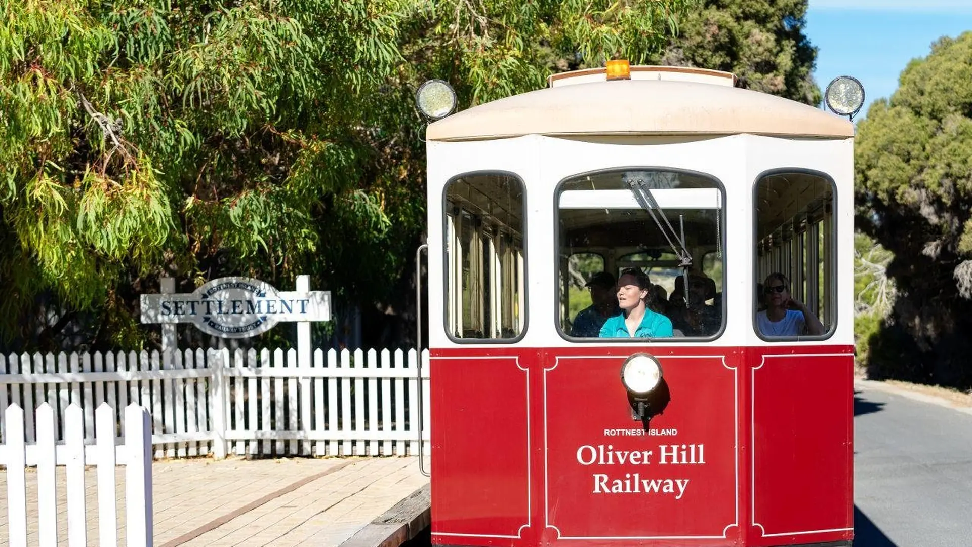 The red and cream Oliver Hill Railway train at the settlement station on Rottnest Island, from the Grand Island day tour listing