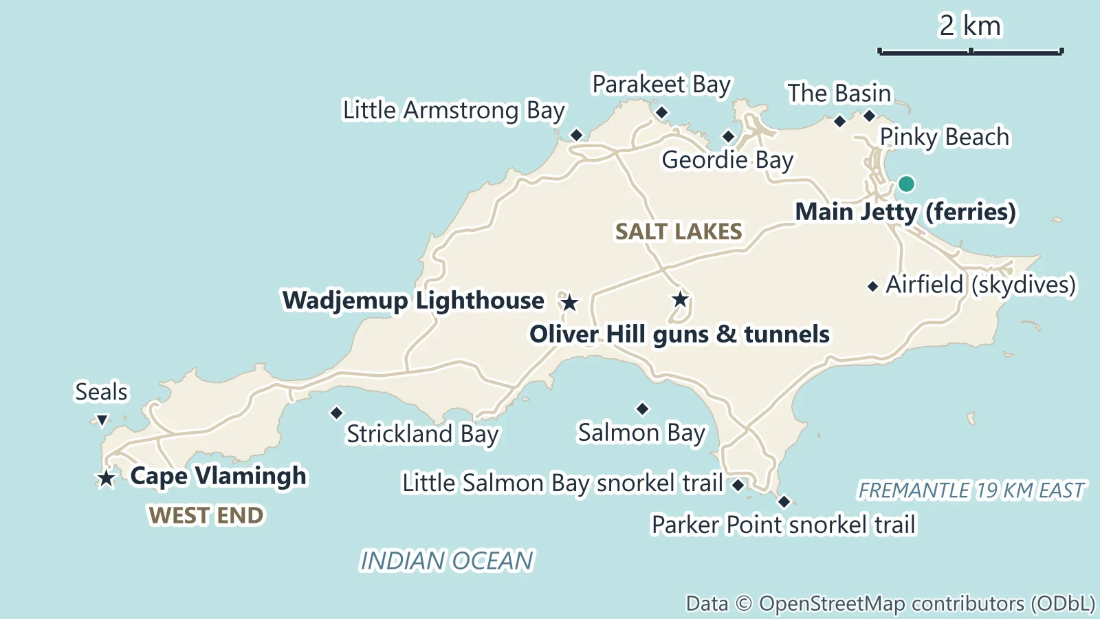 Map of Rottnest Island marking the Main Jetty at Thomson Bay, Pinky Beach, The Basin, Geordie Bay, Parakeet Bay, Little Armstrong Bay, Wadjemup Lighthouse, Oliver Hill, the salt lakes, Salmon Bay, the Little Salmon Bay and Parker Point snorkel trails, Strickland Bay, Cape Vlamingh and the seal colony at Cathedral Rocks, with the island roads